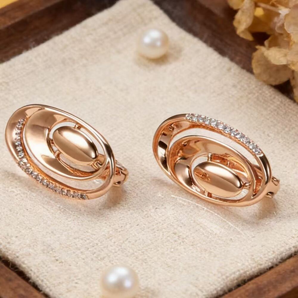 18K gold U-shaped earrings set with cubic zirconia